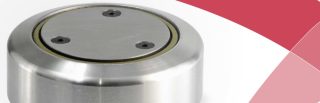 Round combination bearing with three screw holes in smooth metal housing and red design accent